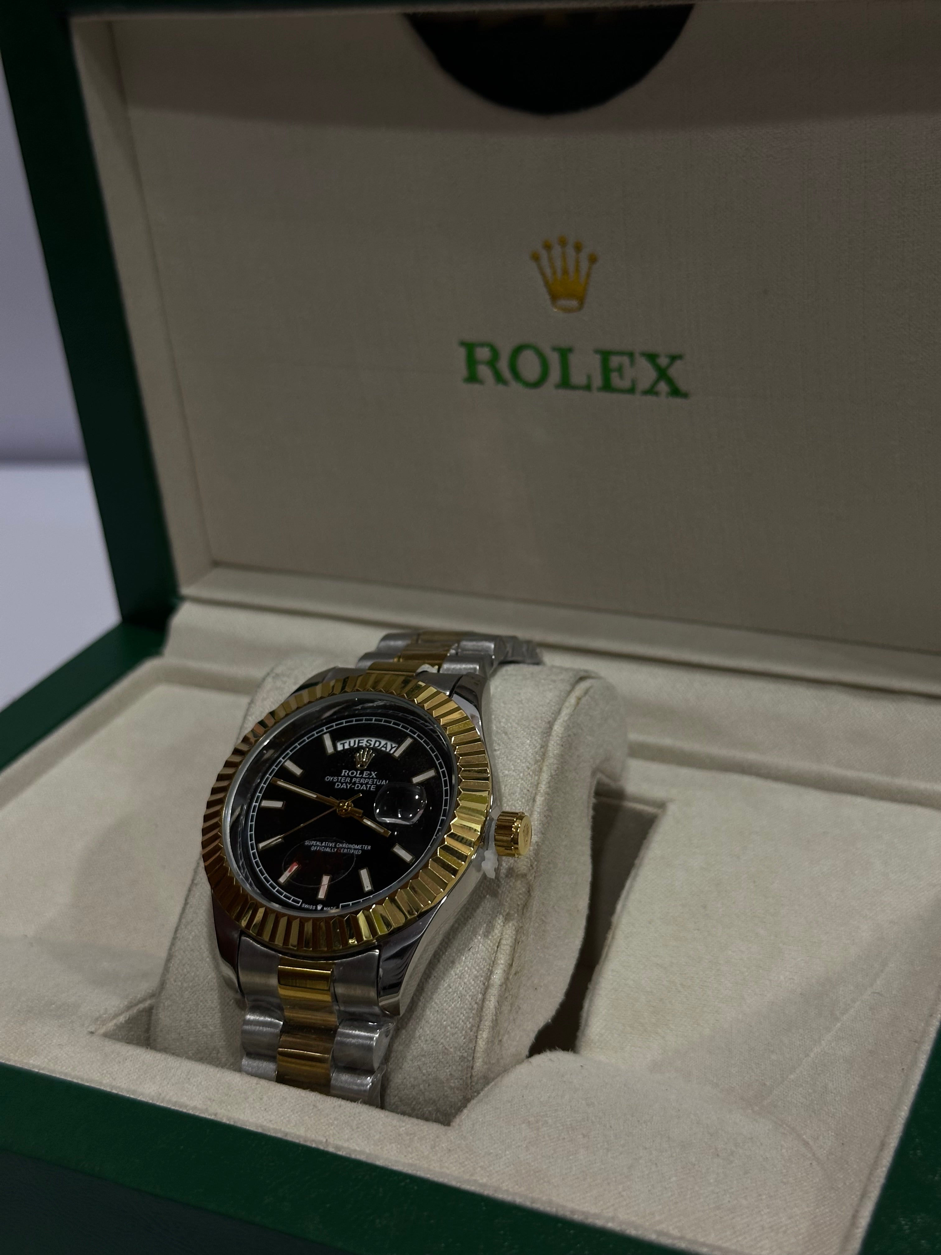 ROLEX WATCH WITH BLACK,GOLDEN DIAL AND SILVER,GOLDEN CHAIN