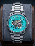 Patek Philippe watch featuring a distinctive turquoise dial and a mechanical movement visible through the dial