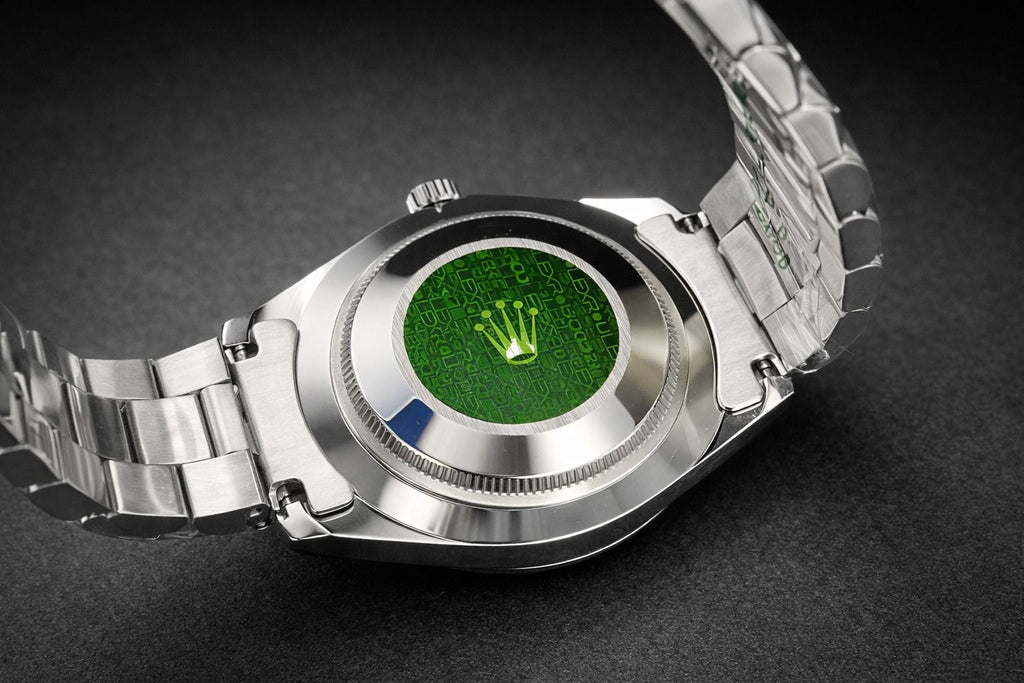 Rolex Day-Date 40 crafted in platinum with a bright black dial and fluted bezel.