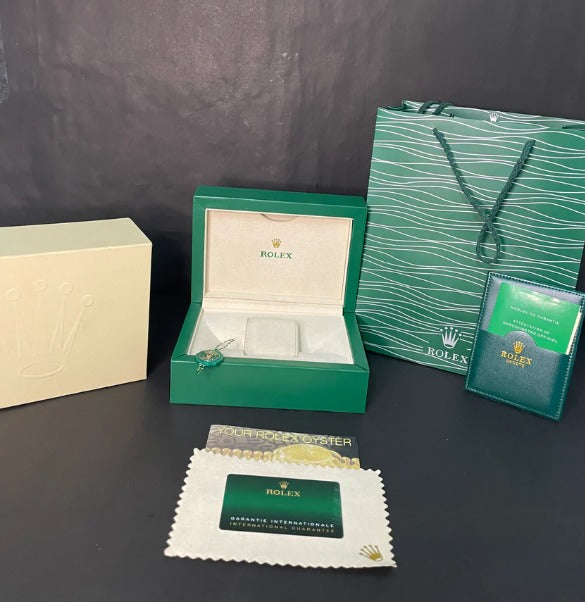 Rolex Day-Date 40 with a blue dial, fluted bezel, and President bracelet