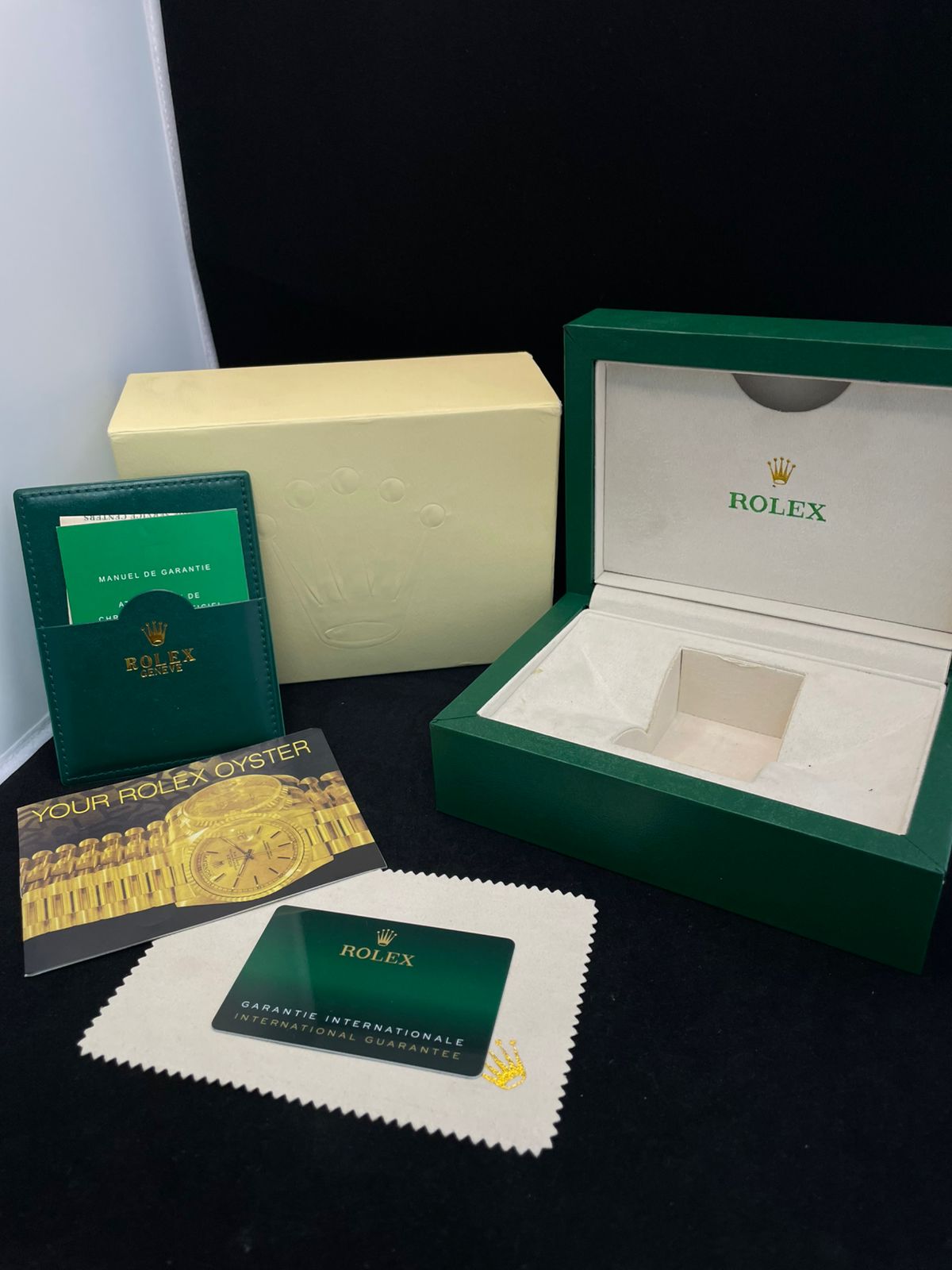 Rolex Cosmograph Daytona, specifically | yellow gold model with a green dial