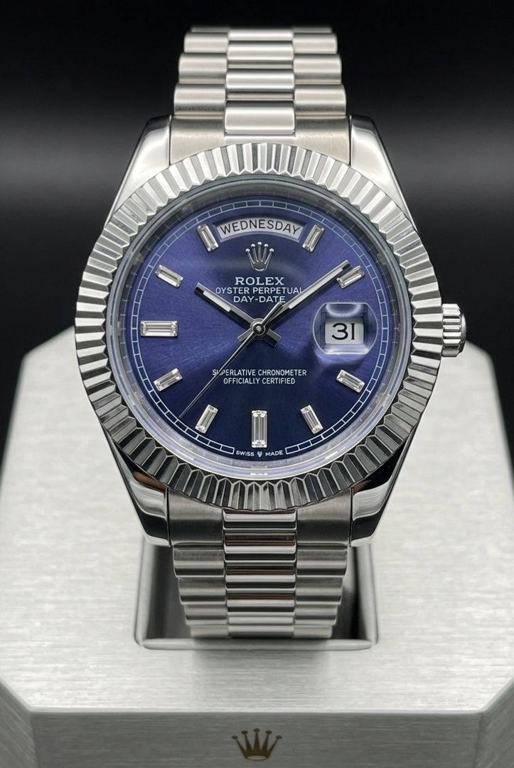 Rolex Day-Date 40 with a blue dial, fluted bezel, and President bracelet